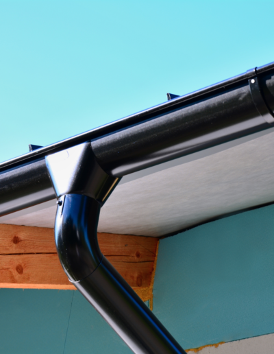 New gutters and downspouts installed alongside siding repair on Ohio home