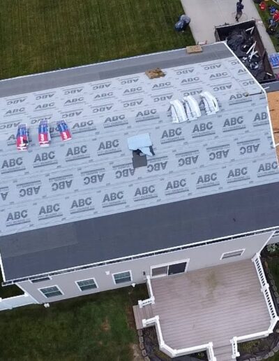 Roofing crew completing a residential roof replacement in Northeast Ohio