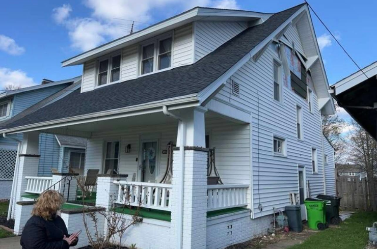 Home exterior before storm damage siding repair