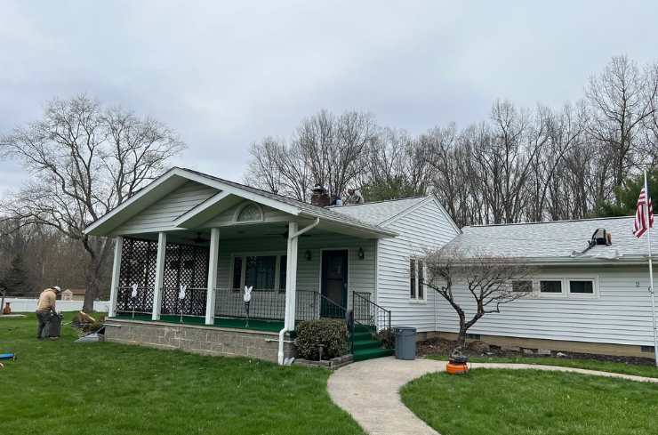 Roof after storm damage repair and new shingle installation by J&K Exteriors